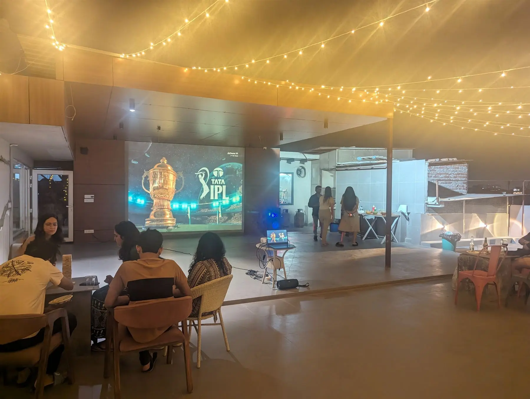 Communrs at an IPL screening at Commune Anant
