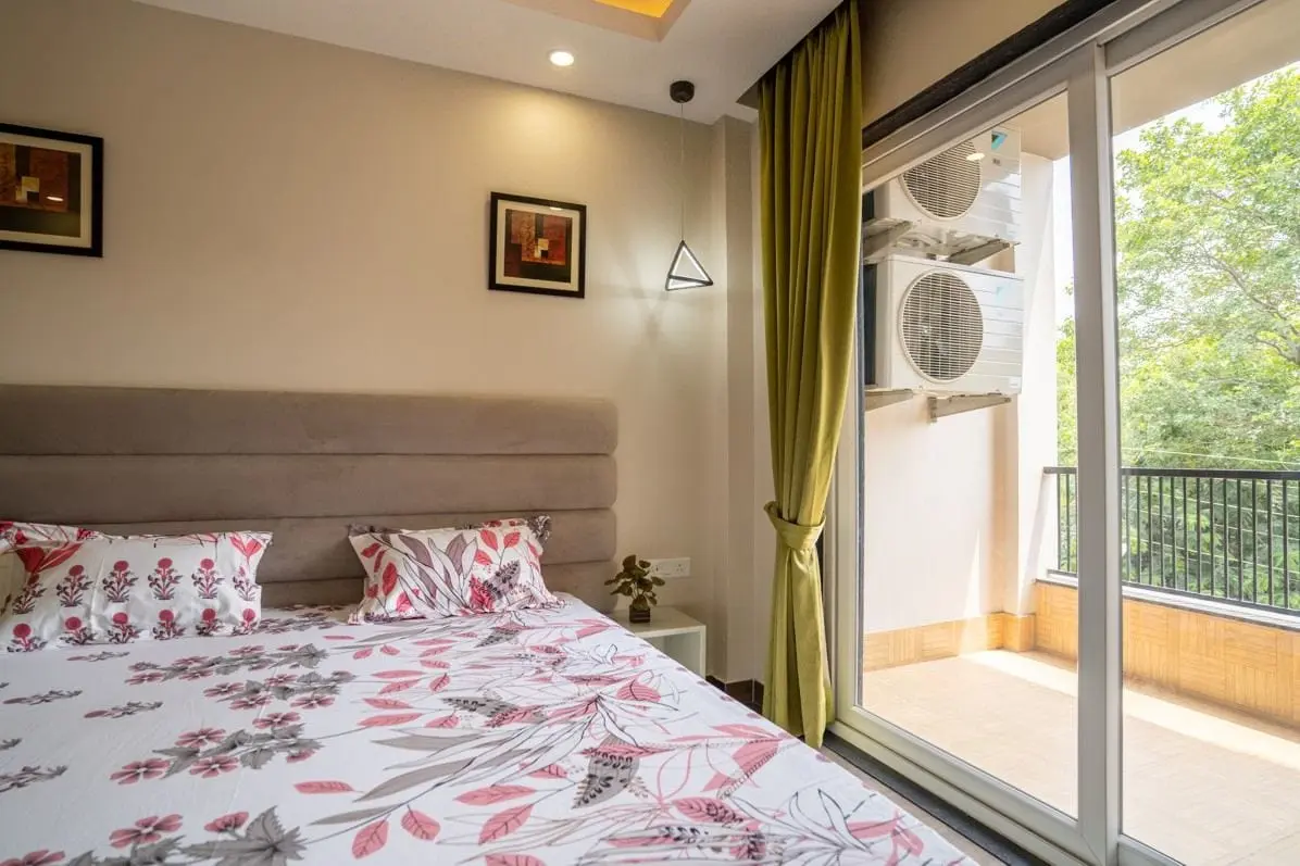 A Commune Anant room opening onto its private balcony