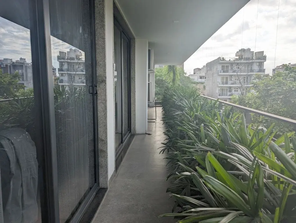 A landscaped balcony at Commune Prime