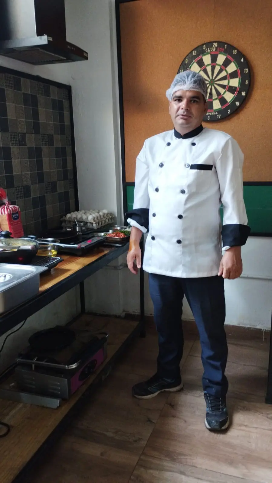 A Commune chef by the dining counter