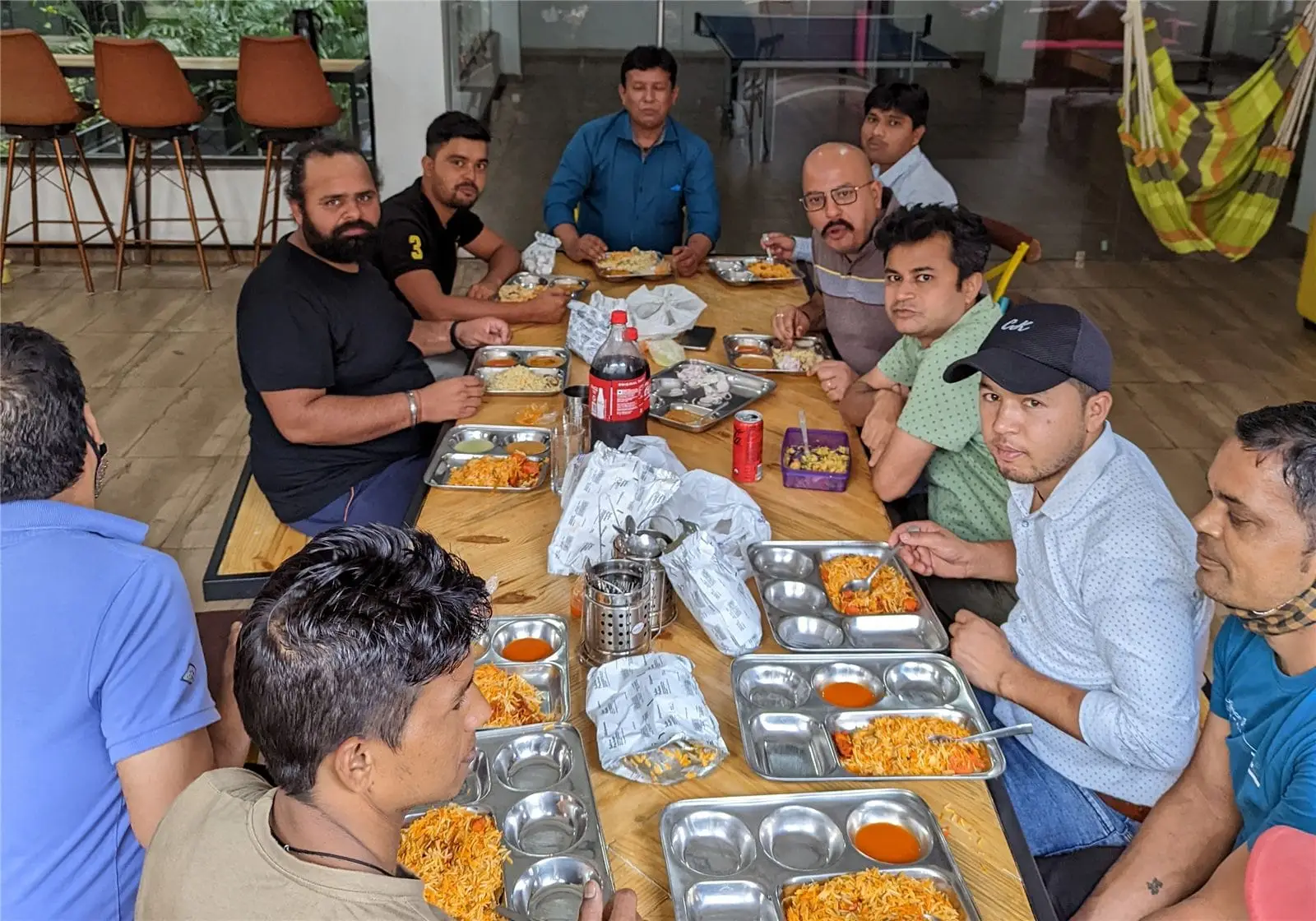 The Commune team around a long lunch table